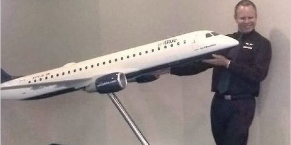 Flight attendant uses inflatable emergency slide to escape annoying passenger