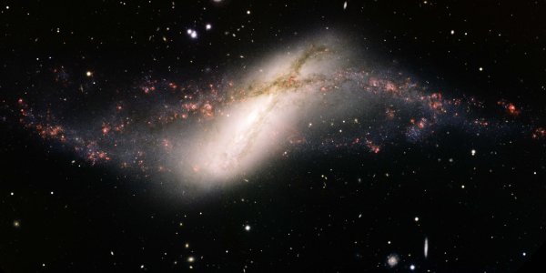 NGC 660 And A Rare Polar-Ring Galaxy