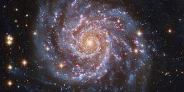 Spiral Galaxies Like Our Milky Way Much Larger Than Thought