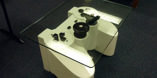 A coffee table for Generation Y - made of a Playstation controller