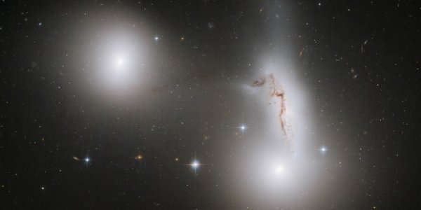 A Gravitational Tug Of War In Piscis Austrinus