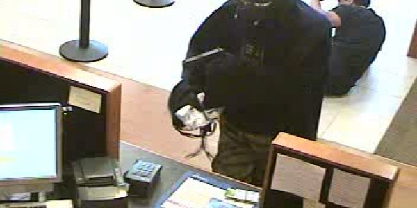 What? No lightsaber? Darth Vader robs a bank
