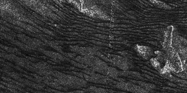 How The Fast Winds Of Titan Shape Its Dunes