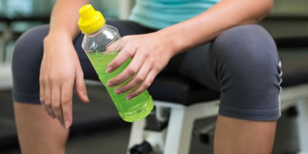 Why Athletes Spit Out Sports Drinks Instead Of Swallowing